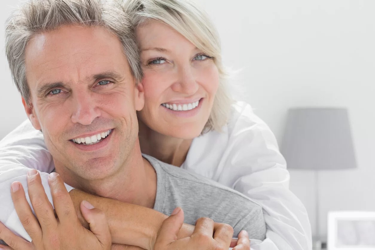 Smiling middle-aged people